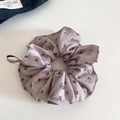 Close-up of vintage floral scrunchie in rose pink linen with a small woven brand label - Grey Khaki Floral - Large Scrunchie