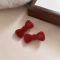 Pair of vintage red acetate bow hair clips with gold France Handmade lettering - Red