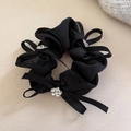 Eleganter schwarzer Satin Haargummi mit Bandschleifen und funkelnden Strassblumen - Schwarz