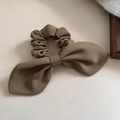 Detailed view of the dark brown scrunchie with twill fabric texture and ribbon bow - Khaki