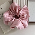 Oversized pink satin scrunchie for women with silky texture and elegant pleats - Pink