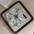Elegant silver sequin scrunchie with handmade jewelry tag on a rustic wooden tray - 1# Pearl White Shell