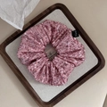Detail of light pink sequin scrunchie hair tie with sparkling texture and brand tag - 5# Pink