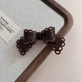 Close-up of a dark brown acetate bow hair clip with lace edges on a rustic wooden tray - 3# Coffee Hair Clip