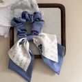 Detail of silk hair scrunchie with navy blue butterfly print and calligraphy ribbons - Blue Butterfly Streamer Scrunchie