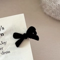 Elegant black velvet bow hair clip for women with vintage minimalist style on display - Mini Bowknot Necklace / Black