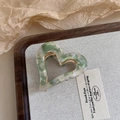 Marbled green heart-shaped hair claw clip made of acetate on a wooden display tray - 5# Green White