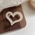Detail of minimalist cream heart hair claw clip with golden spring on wood - Heart Shape / Jelly White - Heart