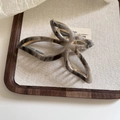 Elegant marble butterfly hair claw with golden metal frame for hair styling - Grey