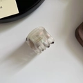 Elegant acetate small hair claw clip in translucent milky coffee color with golden lettering - Gray Marble