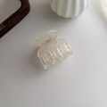 Detail view of a creamy beige matte hair claw clip with a strong metal spring mechanism - Off White (2#)