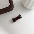 Translucent dark grey acetate bow hair clip with red accent and gold logo - Dark Grey