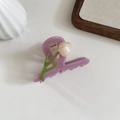 Detail shot of a small 3D tulip hair claw clip in purple acetate with a metal spring - Purple