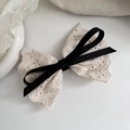 French lace bow hair clip in cream white with a contrasting black ribbon center - Spring Clips / White Black Bow Spring Clip