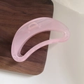 Detailed view of pink translucent crescent hair claw clip with sturdy metal spring - Pink