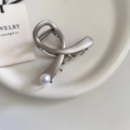 Minimalist matte silver cross hair claw clip with white pearl detail on ceramic plate - Matte Silver
