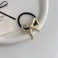 Elegante elastico per capelli con fiocco in metallo dorato su vassoio bianco pulito - 1# Oro