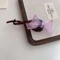 Close-up of a translucent lavender bow hair clip with an amber resin banana clip - 2# Purple