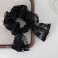 Detailed macro view of black lace scrunchie with elegant bow and pearl embellishments - 4# Black