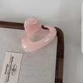 Close-up of translucent pink heart hair claw clip with smooth jelly-like resin texture - 6# Light Pink Geometric