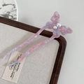 Detail view of purple acetate butterfly hair fork with elegant pearls on U-shaped pin - Blue Pink