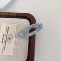 French style light blue oval hair clip with colorful polka dots in a wooden tray - Blue Hollow Oval Hair Clip