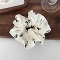 Elegante elastico bianco crema con stampe a fiocco nero e strass scintillanti per capelli - Grande