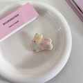 Nahaufnahme einer Hasen-Haarklammer mit Farbverlauf in Macaron-Tönen und Sternen - Stern Hase Haarklammer