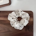 Summer white lace scrunchie with bow tie and floral texture on a wooden tray - 2# Basic Scrunchie Style