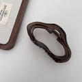 Brown translucent wave-shaped shark hair claw clip in a minimalist Korean style - Cloud Style / Dark Amber Brown