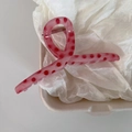 Detail of pink strawberry polka dot hair claw clip made of semi-transparent acrylic - Pink Cross