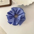 Blue and white striped fabric scrunchie with pleated design on a clean white surface - Light Blue