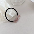 Detail of black elastic hair tie with a purple marble acrylic rectangle handmade charm - Phantom Pink