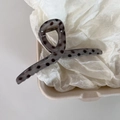 Translucent grey hair claw clip with black polka dots and sleek twisted resin design - Gray Cross