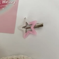 Close-up of Y2K star hair clip with pink gradient acrylic and silver metal base - Pink White