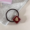 Elastic hair tie with a deep red square resin charm and golden heart detail - Cube / Burgundy