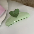 Detail of a large green hair claw clip with dark green hearts on a clean white background - Heart Hair Claw / Green