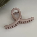 Detail view of the mauve pink matte hair claw clip with deep teeth for thick hair - Light Pink
