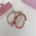 Detail of pink and beige elastic hair ties with rectangular beads and cute patterns - Pink Series - Contentment