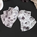Detailed close-up of layered ink floral pattern bow clip with translucent chiffon texture - Large Bow Hair Clip / White