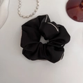 Elegant black satin scrunchie with cream contrast piping for a classic minimalist look - Black-Medium