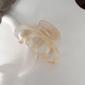 Pinza per capelli in acetato champagne traslucido con dettaglio del logo dorato - Albicocca