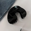 Glossy black jelly hair claw clip with a minimalist round design for everyday styling - Black