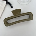Olive green 13cm hollow hair claw clip with glossy finish and storage pouch - Green