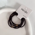 Detail of durable brown elastic hair bands featuring elegant bronze metal beads - Dark Coffee