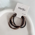 Detail of durable elastic hair bands with golden metallic beads on a white tray - Mixed Colors