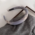 Detail of purple plaid padded headband with a hand made label on the inner fabric - Purple