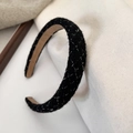 Close-up of black tweed headband with gold and silver plaid pattern and anti-slip lining - Black