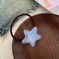 Elastic hair tie with iridescent ice blue star charm on a vintage wooden tray - Star Shape (Blue Hair Tie) / Blue Hair Tie