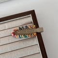 Colorful knitted wool hair clip with contrast stitching and khaki metal duckbill base - Khaki